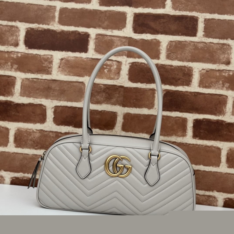 G*u*i top handle bags